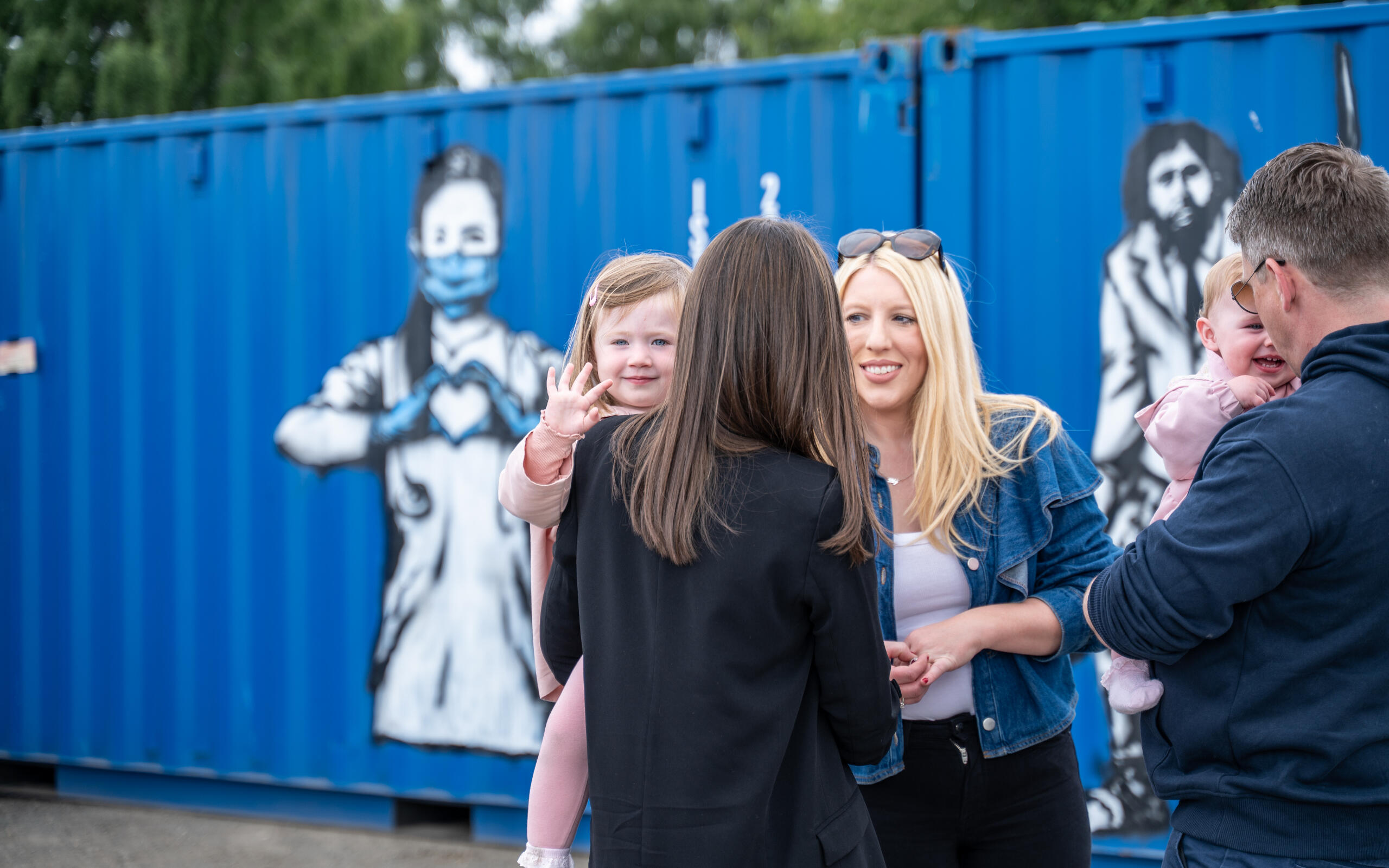 Group of friends at the Rebel Bear street art exhibition at Boxxs Linlithgow Group of friends visiting the Rebel Bear street art exhibition at Boxxs Self Storage in Linlithgow, a unique open-air gallery for Bo’ness and West Lothian visitors